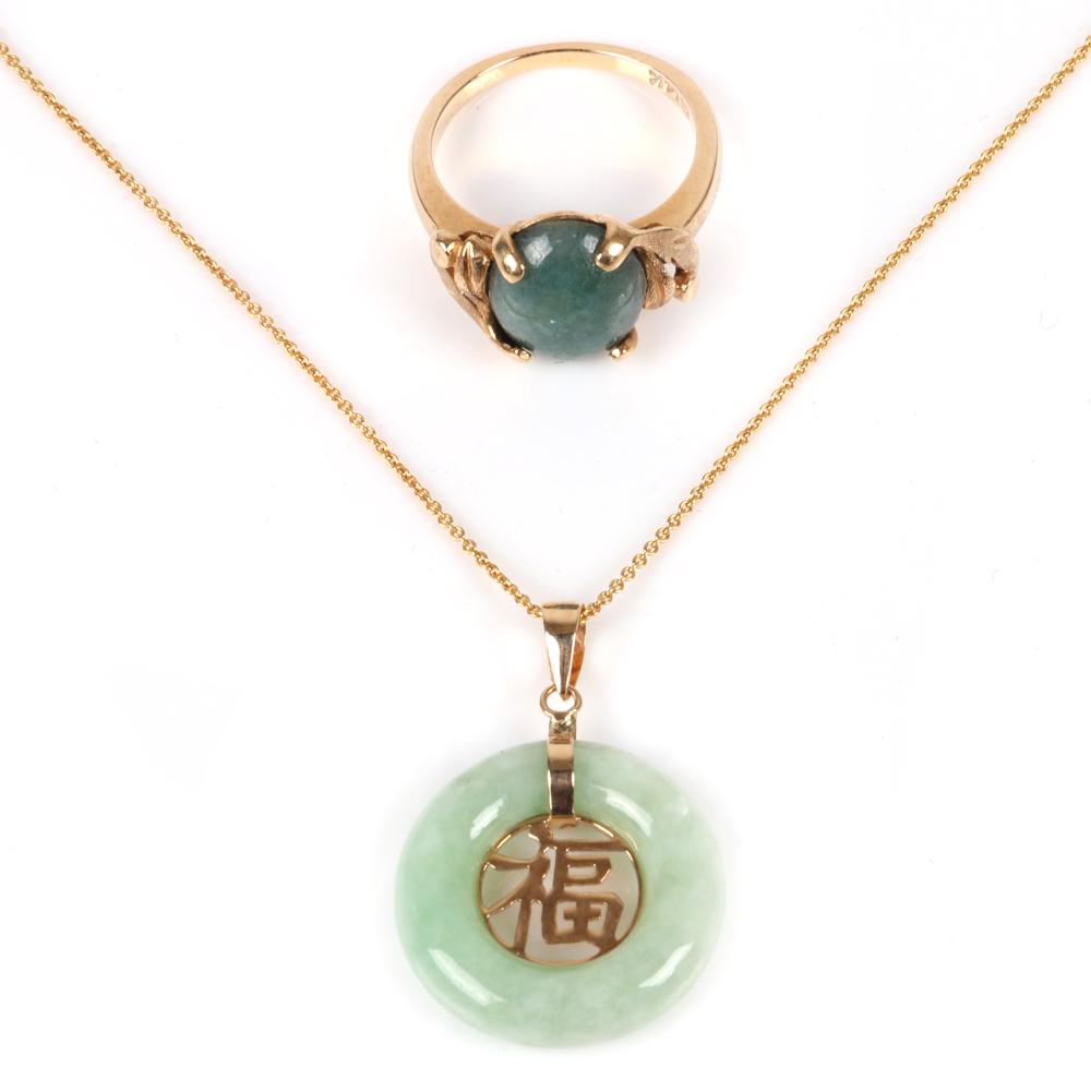 Appraisal: GOLD K NECKLACE WITH ROUND JADE PENDANT SURROUNDING CHINESE CHARACTER