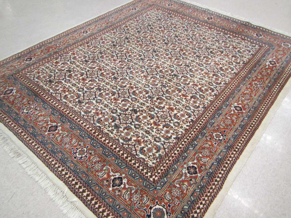 Appraisal: HAND KNOTTED ORIENTAL CARPET Indo-Persian overall Herati floral motif on