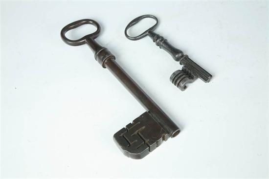 Appraisal: TWO LARGE KEYS Eighteenth century Includes a European steel key