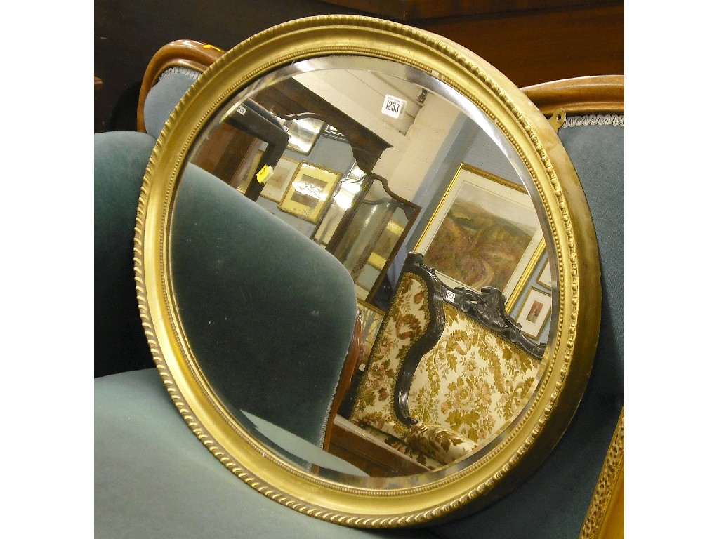 Appraisal: th century oval gilt bevelled wall mirror with bead work