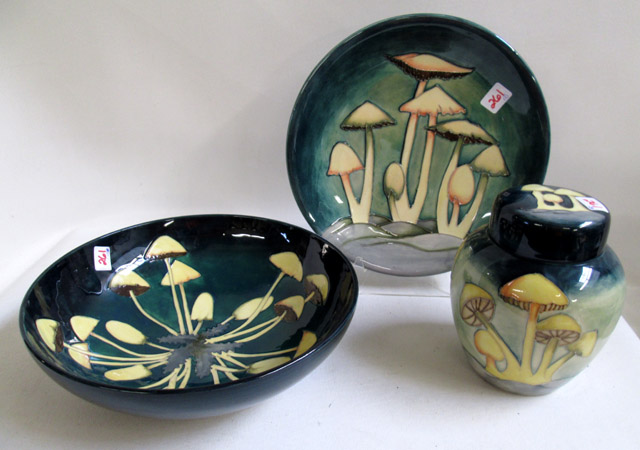 Appraisal: MOORCROFT POTTERY JAR PLATE AND BOWL hand painted under glaze