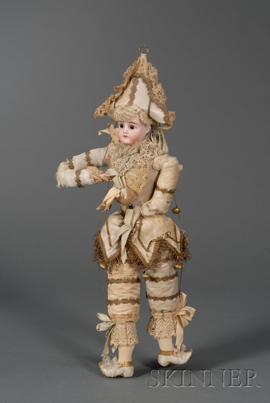 Appraisal: Polichinelle Marionette Doll with German bisque socket head impressed open