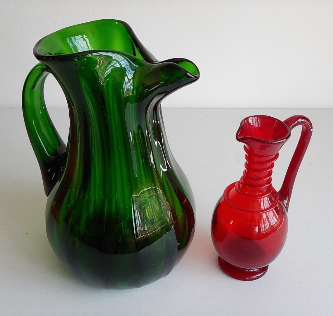 Appraisal: A Victorian green fluted glass ice water jug cm high