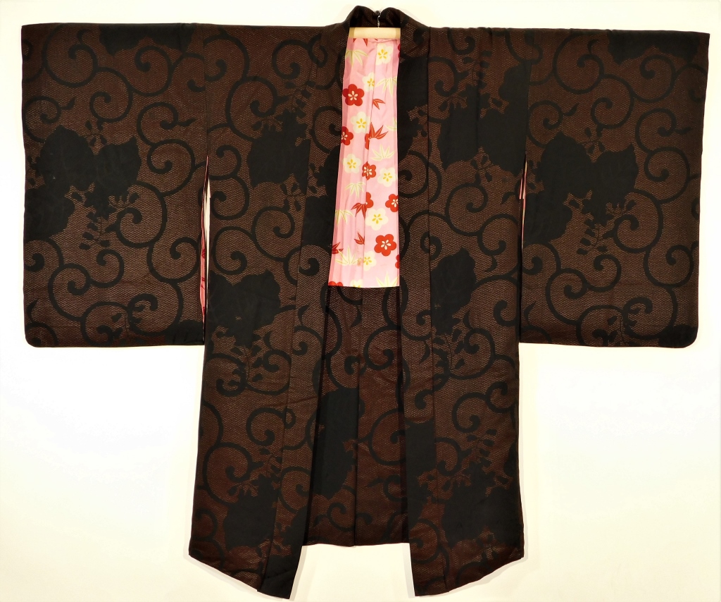 Appraisal: JAPANESE CRESTED BLACK TENDRIL AND FLOWER HAORI Japan - th