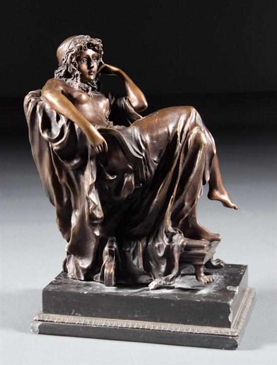 Appraisal: French bronze figure of a seated draped nude female brown