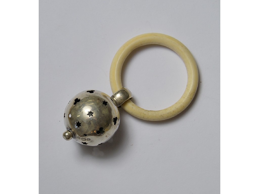 Appraisal: Child's rattle formed of hollow silver ball with teething ring