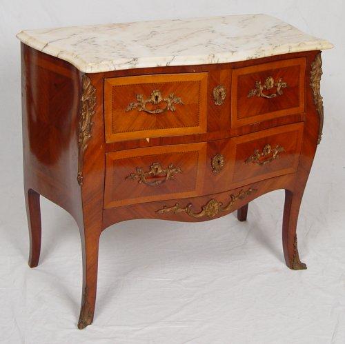 Appraisal: ORMOLU MOUNTED FRENCH STYLE MARBLE TOP COMMODE Beveled and shaped