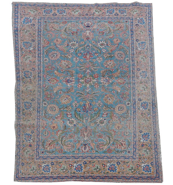 Appraisal: A TABRIZ MID BLUE GROUND SMALL CARPET with radiating polychrome