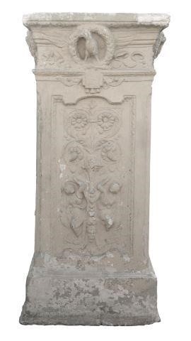 Appraisal: Cast stone pedestal th c having decorative side panels rising