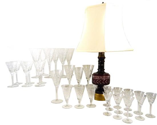 Appraisal: GLASS Cranberry cut to clear lamp and cut glass stemware