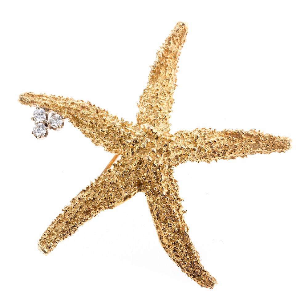 Appraisal: A Ladies K Starfish Pin with Diamond Accent K yellow