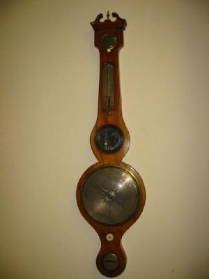 Appraisal: A FIVE GLASS MAHOGANY WHEEL BAROMETER mid th century with