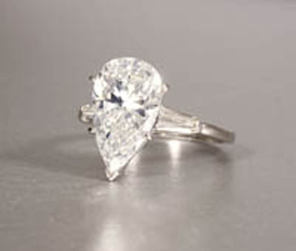 Appraisal: A pear-shaped diamond ring A pear-shaped diamond ring Platinum set