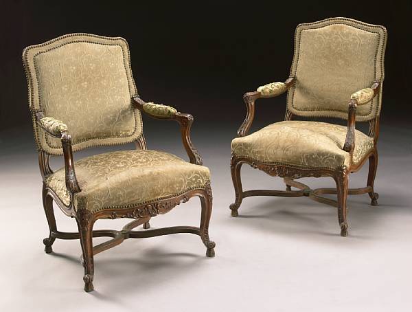 Appraisal: A pair of Regence style walnut fauteuils first quarter th