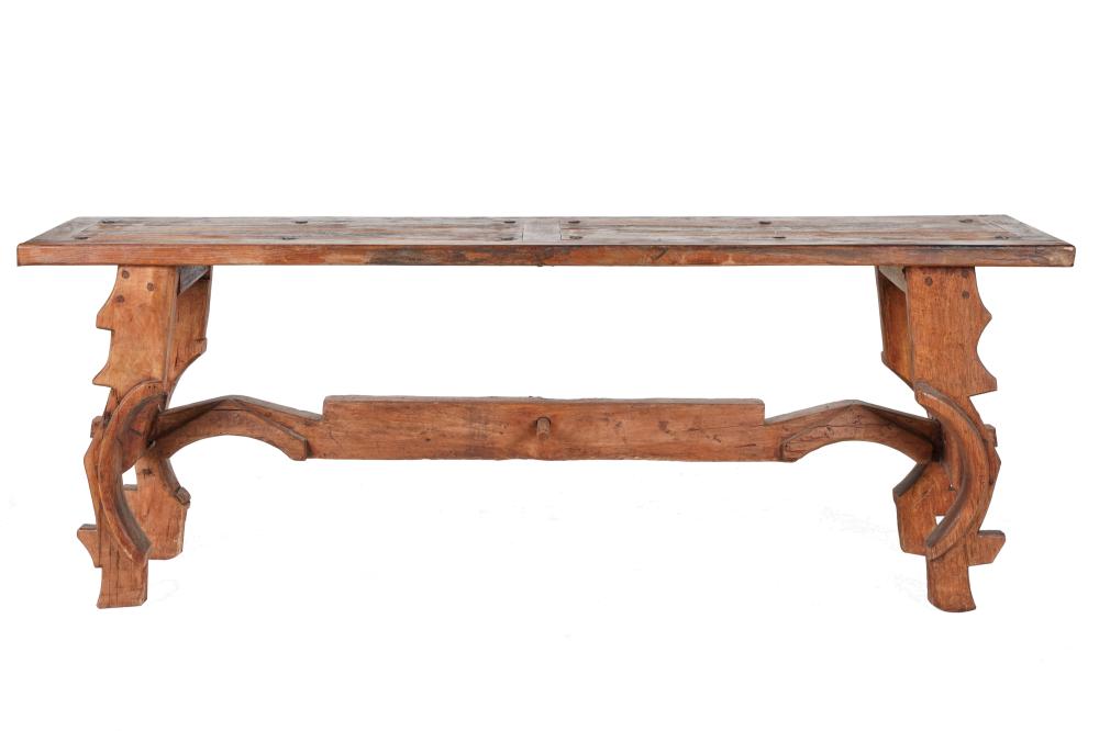 Appraisal: RUSTIC CARVED WOOD SOFA TABLEwith through-tenon stretcher inches wide inches