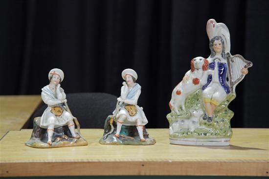 Appraisal: THREE STAFFORDSHIRE FIGURES Pair of incense holders with hunters ''h