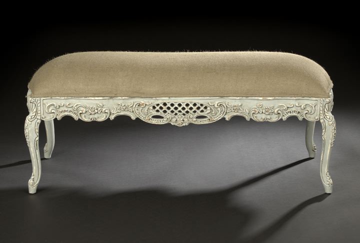 Appraisal: Provincial Rococo-Style Polychromed Bench the padded rectangular top above a