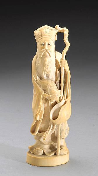 Appraisal: An ivory okimono of Jurojin Standing in the garb of