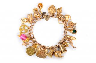 Appraisal: English K Multi English k multi-charm bracelet London hallmark maker's