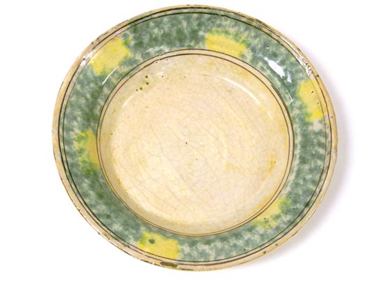 Appraisal: Tin glazed spongeware decorated dish th C tin glazed sponeware