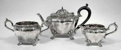 Appraisal: An Edward VII bachelor's silver three piece tea service with