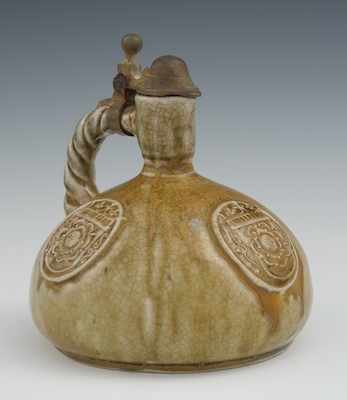 Appraisal: A German Stoneware Ewer German ewer with metal fitting and