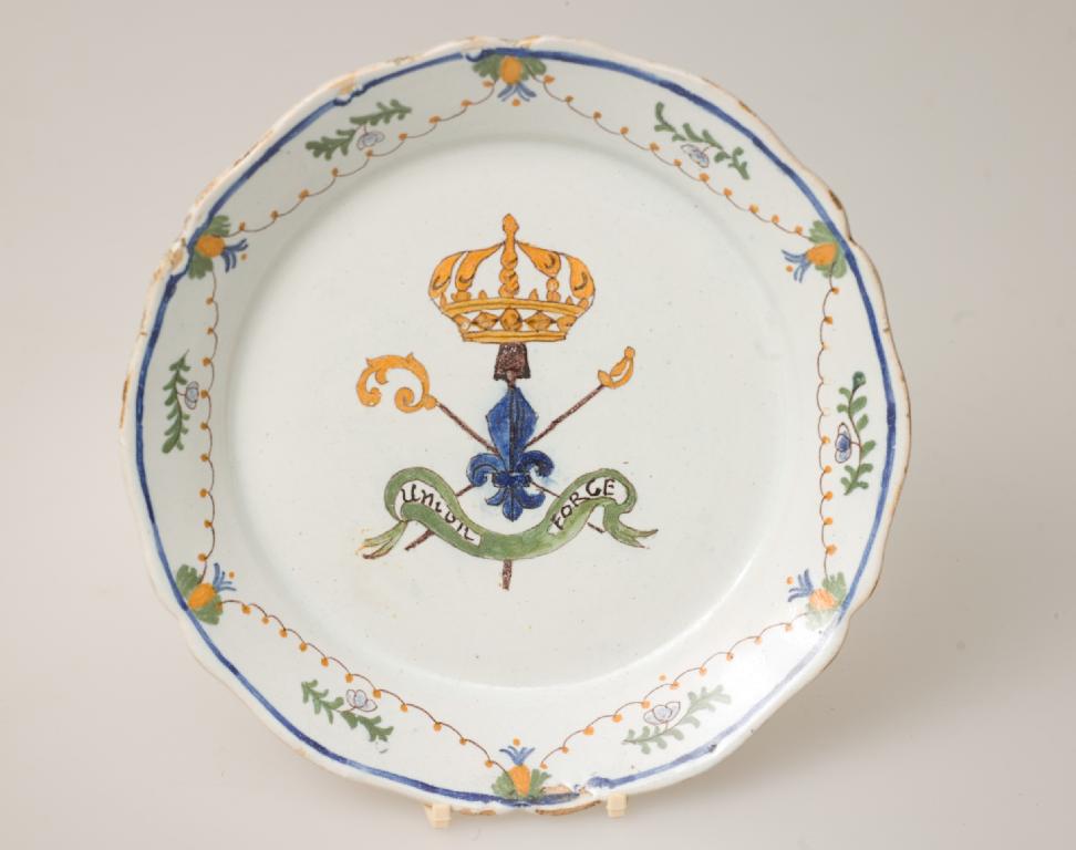 Appraisal: LATE th CENTURY DELFT PLATE with scalloped rim and polychrome