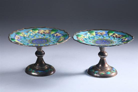 Appraisal: PAIR CHINESE ENAMELLED SILVER STEM DISHES Calligraphy and repouss floral