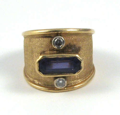 Appraisal: TANZANITE DIAMOND AND YELLOW GOLD RING The k gold band