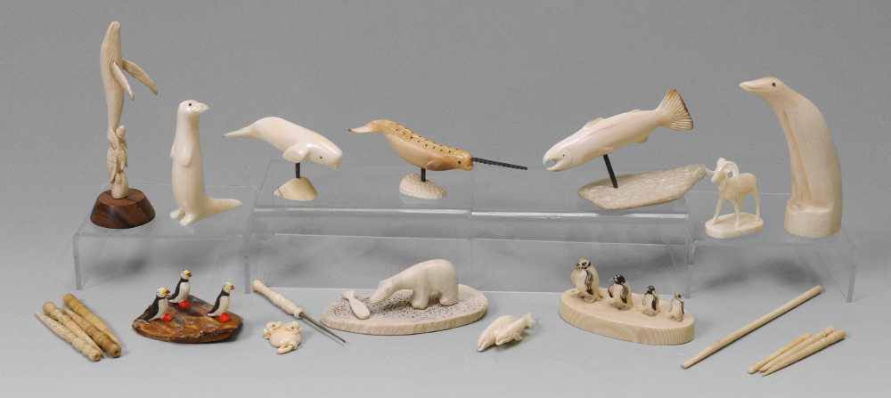 Appraisal: COLLECTION OF CARVED WALRUS IVORY ITEMS An assembled collection of