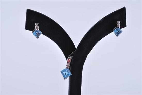 Appraisal: A PAIR OF TOPAZ AND DIAMOND SET EARRINGS WITH CONFORMING