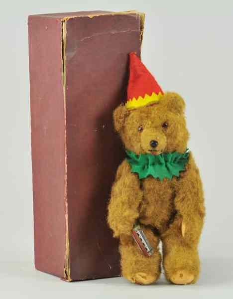 Appraisal: BOXED HARMONICA BEAR Early German Harmonica Bear boxed example plush