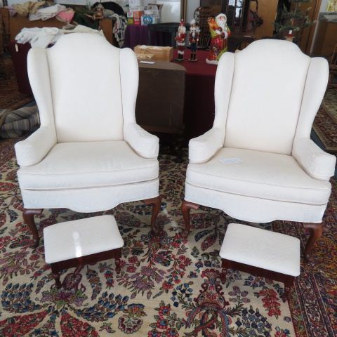 Appraisal: Pair of Ethan Allen Wing Back Chairs with foot stools