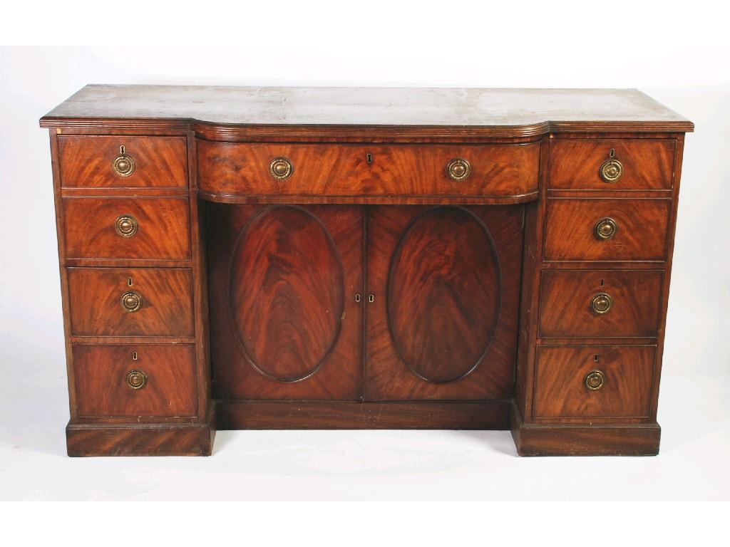 Appraisal: EARLY NINETEENTH CENTURY MAHOGANY BREAKFRONT SIDEBOARD the reeded top above