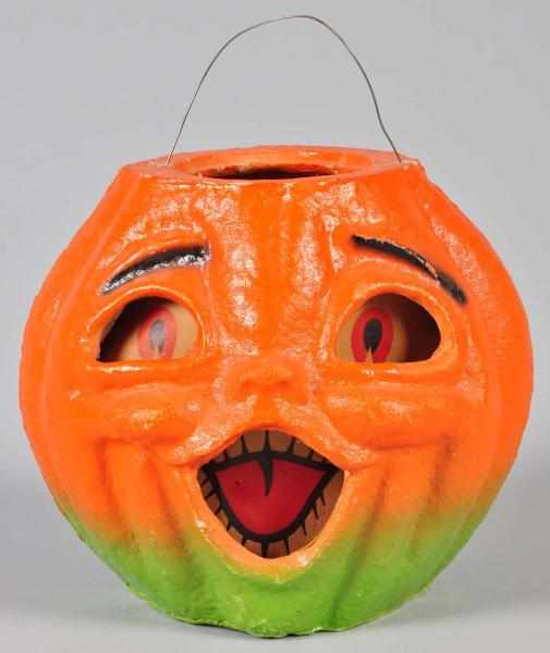 Appraisal: Pulp Halloween Jack-O-Lantern Description Original paper inserts No damage or