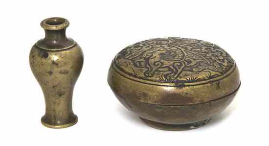 Appraisal: A Chinese Bronze Lidded Circular Box having decoration on the