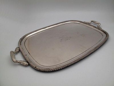 Appraisal: A George III old Sheffield plated two-handled tray unmarked circa