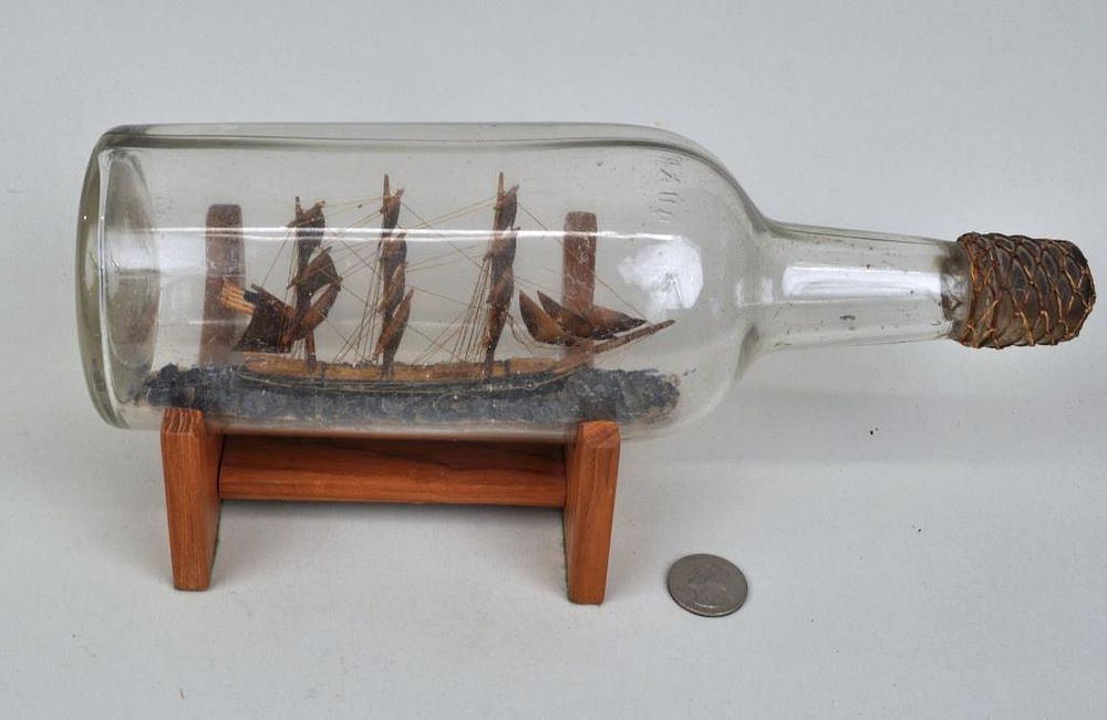 Appraisal: American Ship in Bottle on Wood Stand high wide Provenance