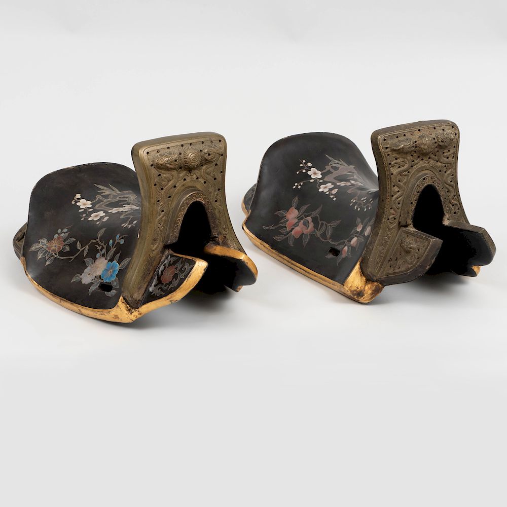 Appraisal: Pair of Chinese Gilt-Metal Mounted Lacquer Ceremonial Saddles Each pommel