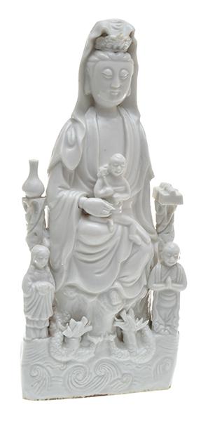 Appraisal: A BLANC DE CHINE GUANYIN WITH ATTENDANTS SHANCAI AND LONGNU