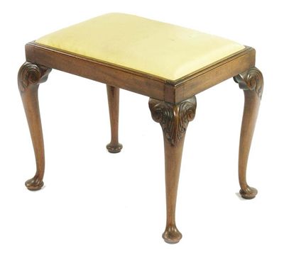 Appraisal: A mahogany footstool in th century style the drop-in seat