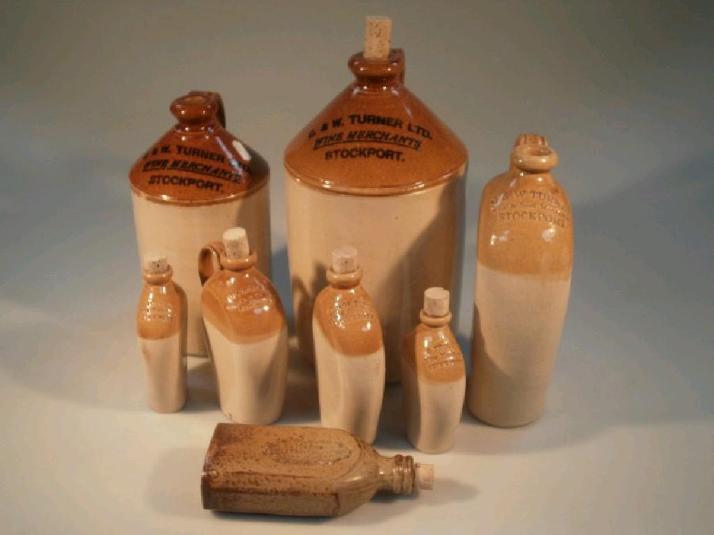 Appraisal: A collection of stoneware flagons and flasks for George and