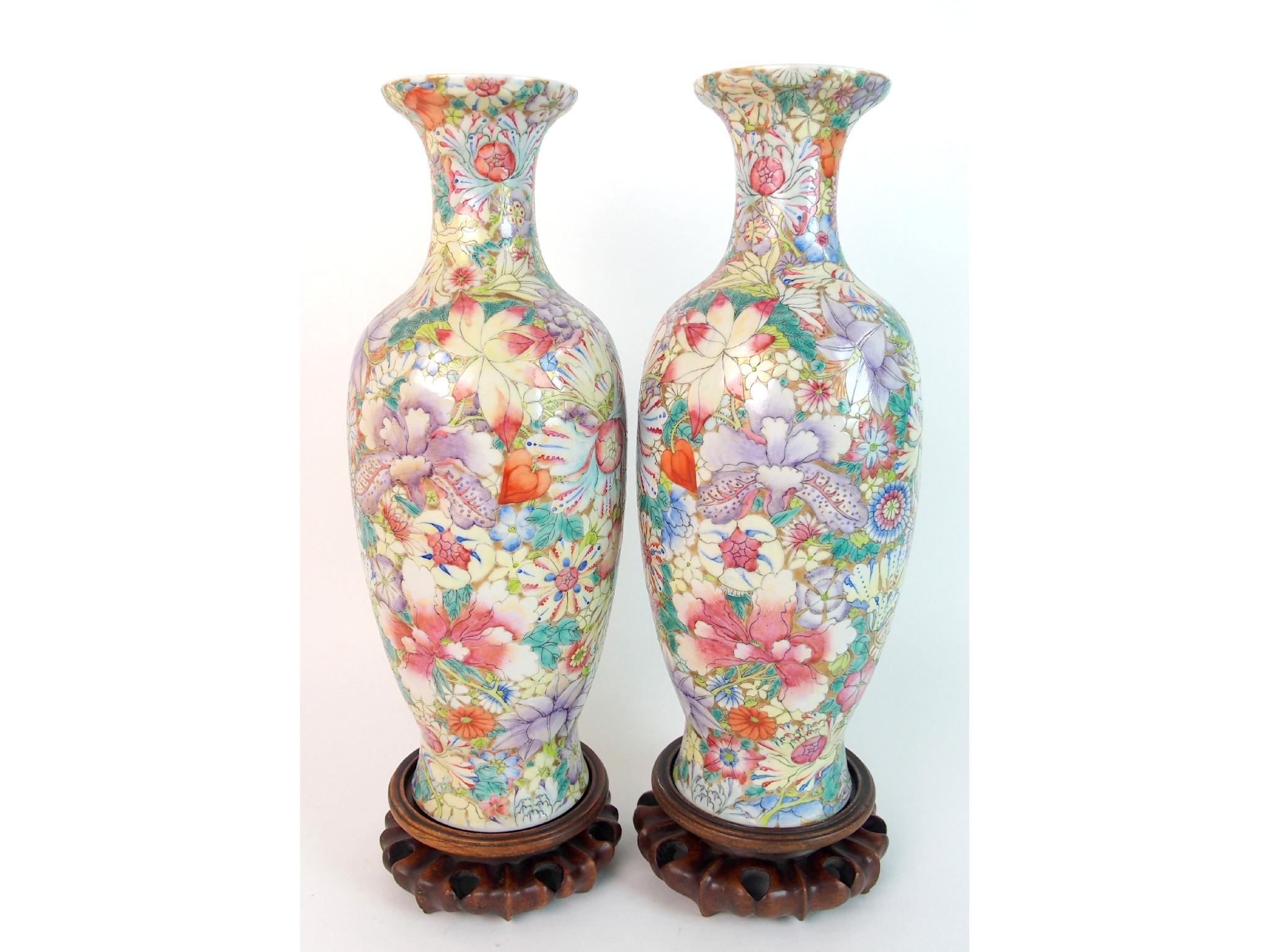 Appraisal: A pair of Canton famille rose millefiori baluster vasesred seal