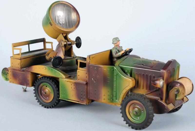 Appraisal: Hausser Clockwork Tinplate Searchlight Truck Working clockwork mechanism One headlight