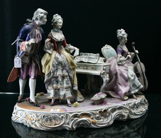 Appraisal: A late th century German porcelain musical group of two