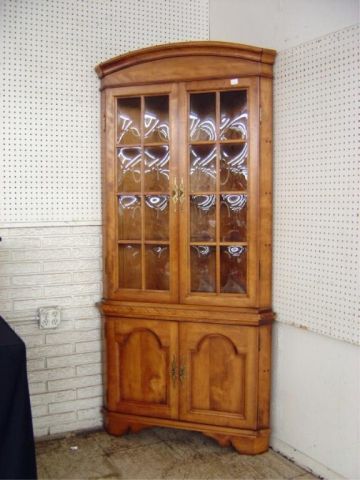 Appraisal: MAPLE CONVEX GLASS CORNER CABINET