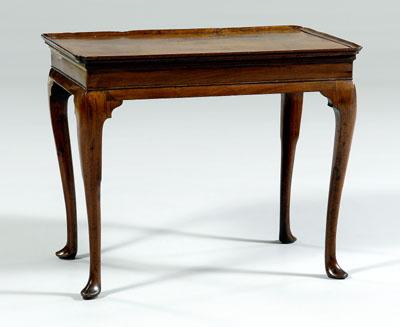 Appraisal: Irish Queen Anne tray-top tea table figured single-board mahogany top