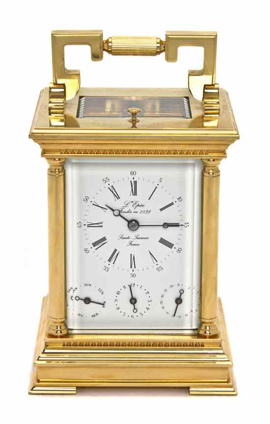 Appraisal: A French Brass Carriage Clock L'Epee of rectangular handled form