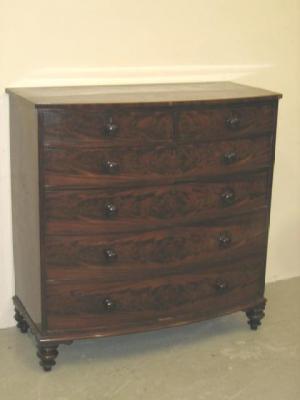 Appraisal: A VICTORIAN MAHOGANY CHEST of bowed form two short over