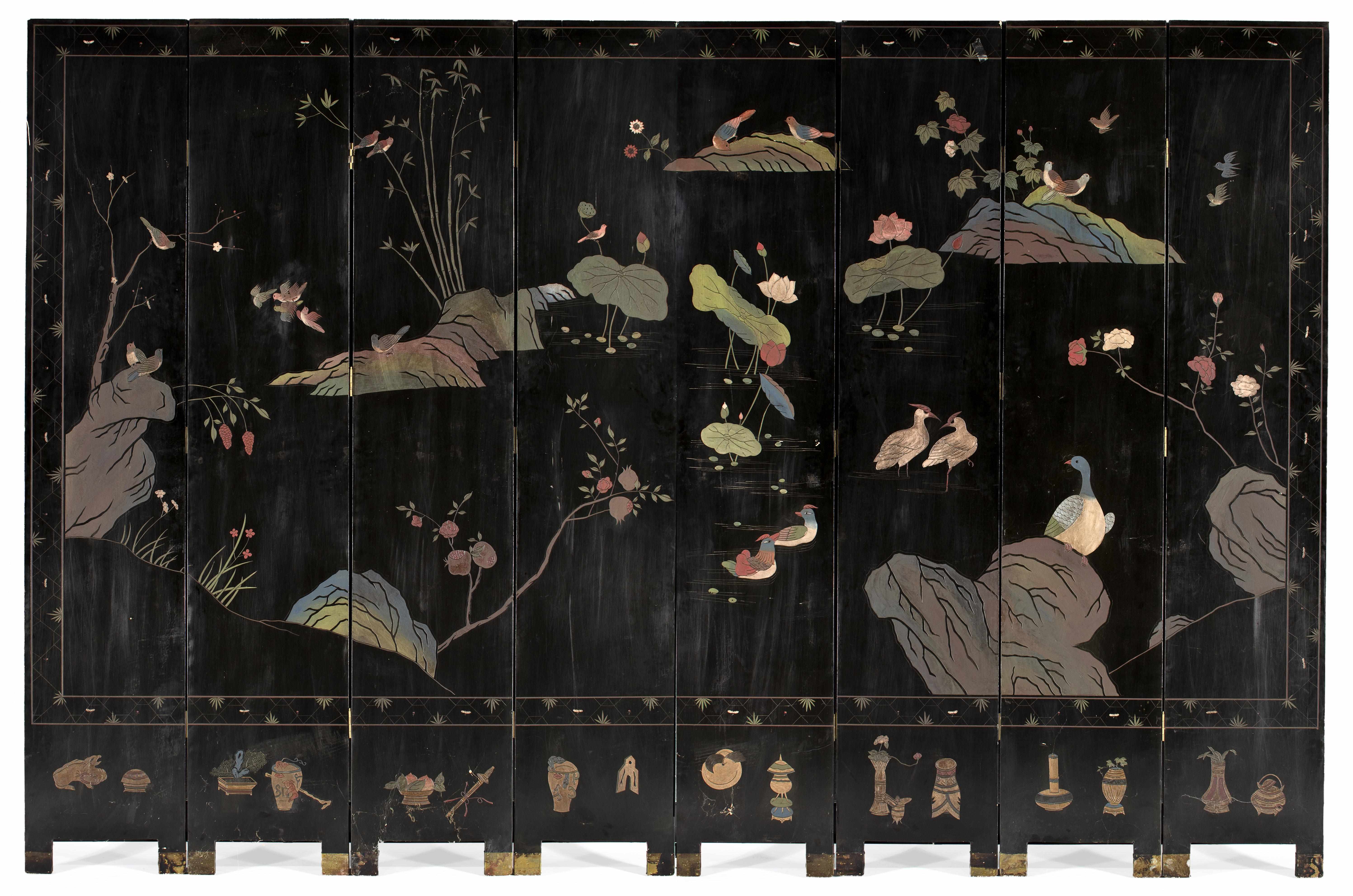 Appraisal: A Chinese carved lacquer eight panel folding screen first half